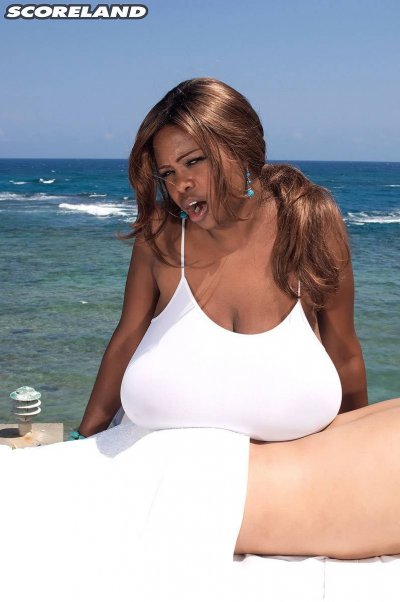 Ebony big tits Miosotis just fucking in the beach at Scoreland